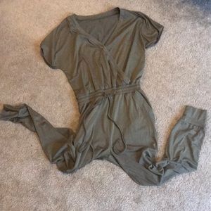 olive green short sleeved jumpsuit w/ pockets